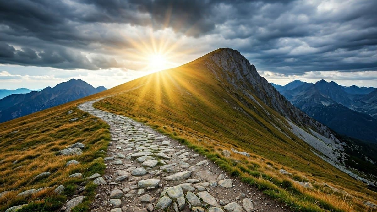 A mountain path symbolizing the challenges and rewards of perseverance, with a sunlit peak representing success.