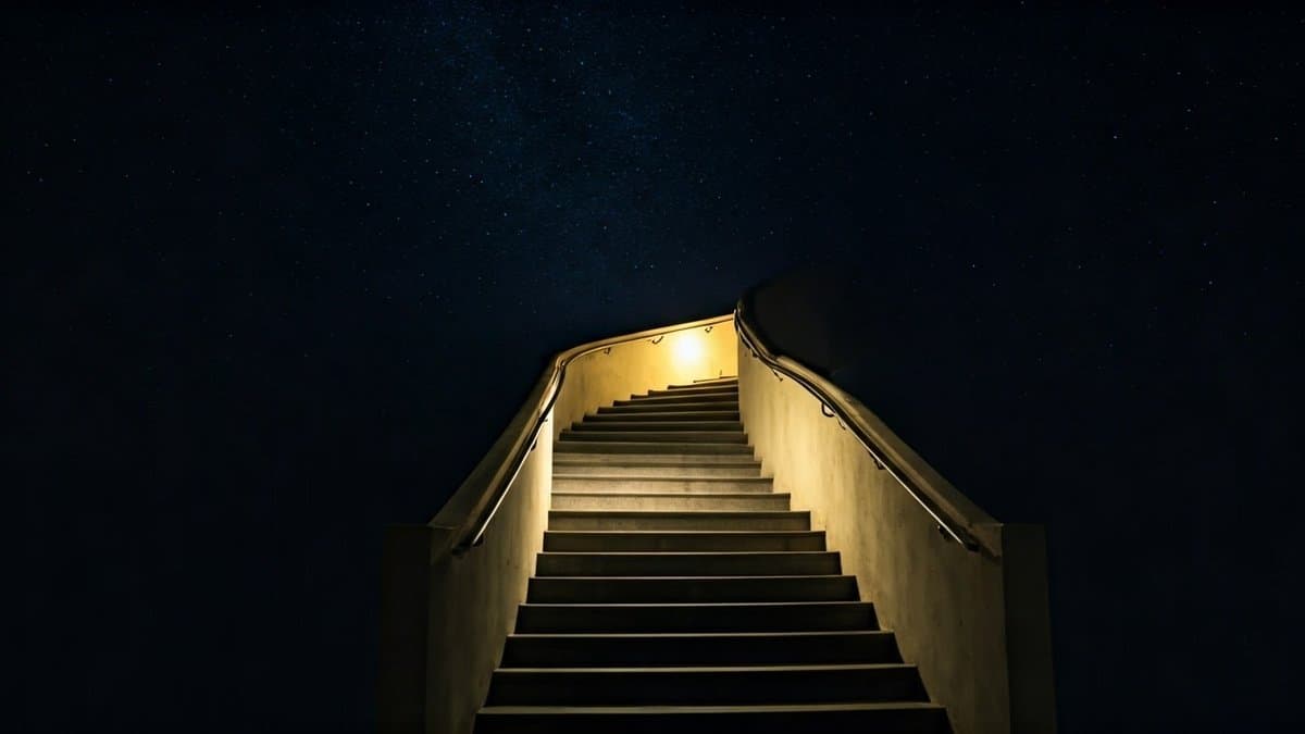 A staircase leading into a dark night sky, symbolizing the journey into the unknown, with a warm light representing hope and courage.